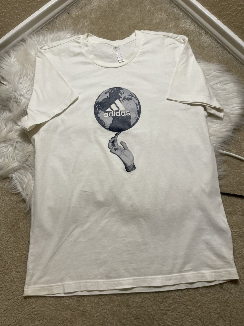 Nike unique Black And White shirt with the “World At Your Finger Tips” design L